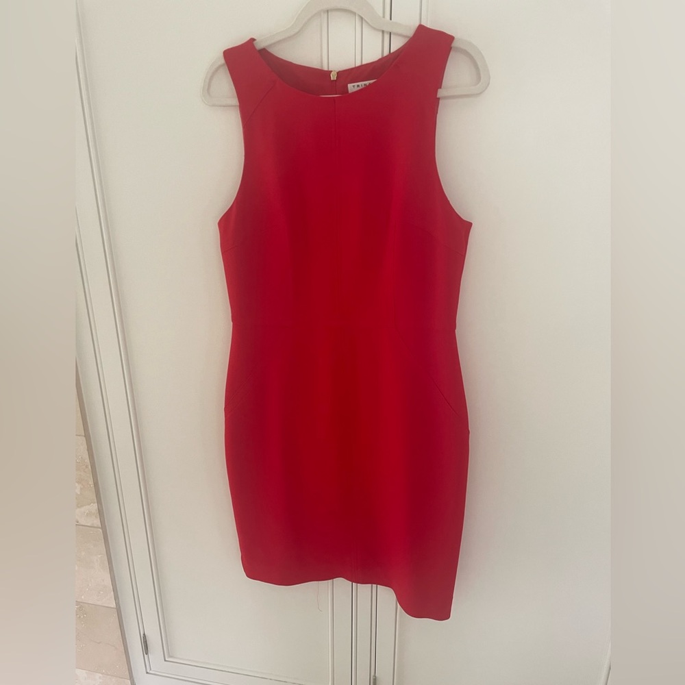 Trina Turk, size 10. Red sleeveless dress great for work! Work only once.